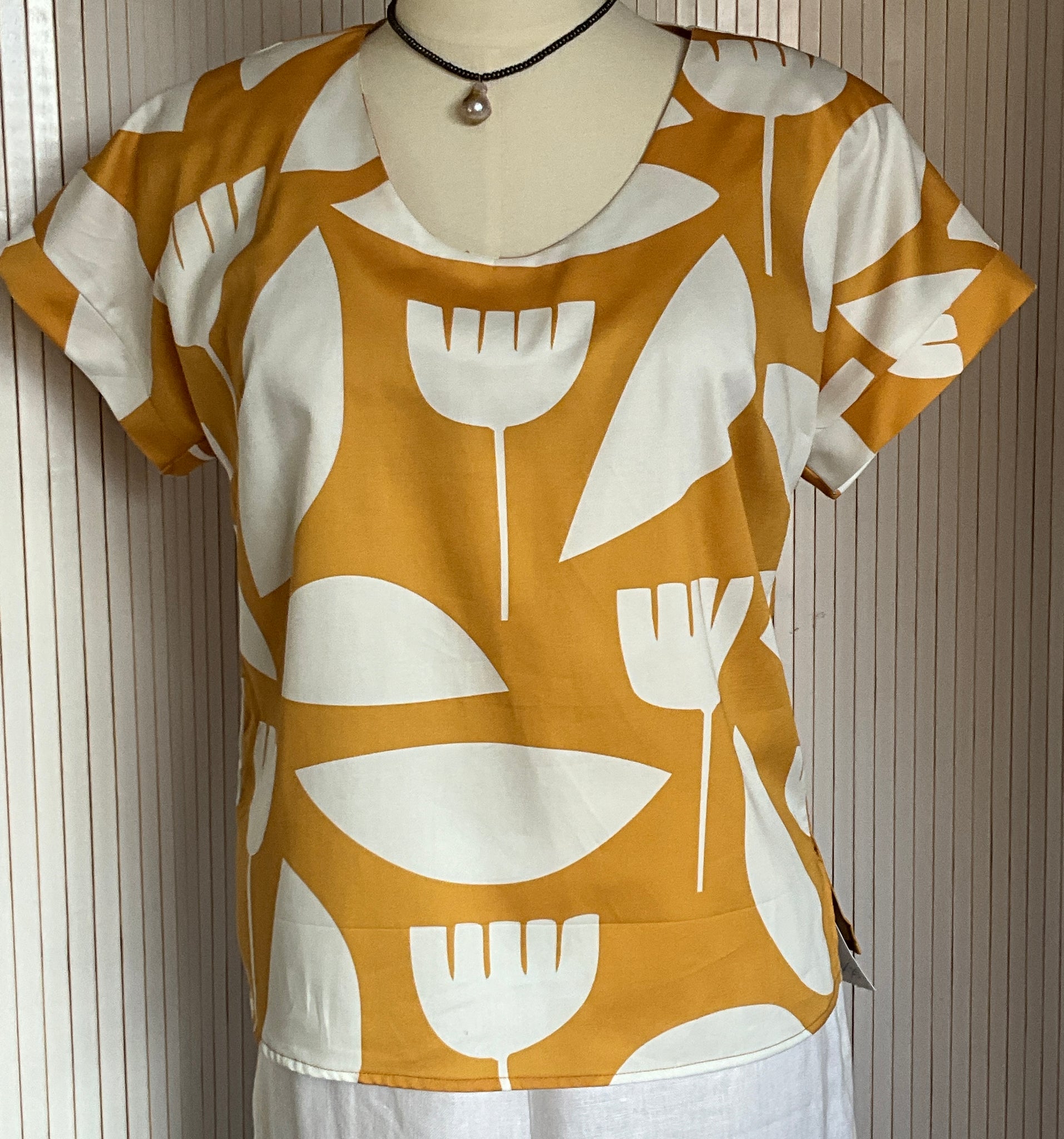 Sunshine yellow abstract floral top. Easy to wear organic cotton sateen.