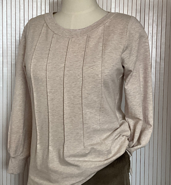 Leisure top, warm beige tucked cotton knit.